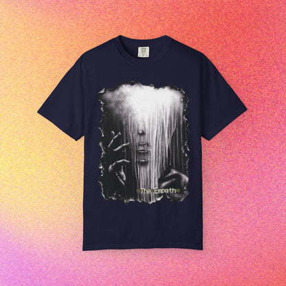 Garment-dyed T-shirt with a moody monochrome expressive portrait graphic on the front.