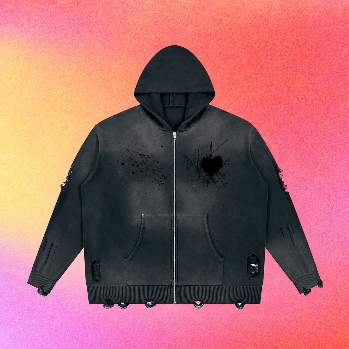 Close-up of the zipper area and distressed heart artwork on the hoodie.